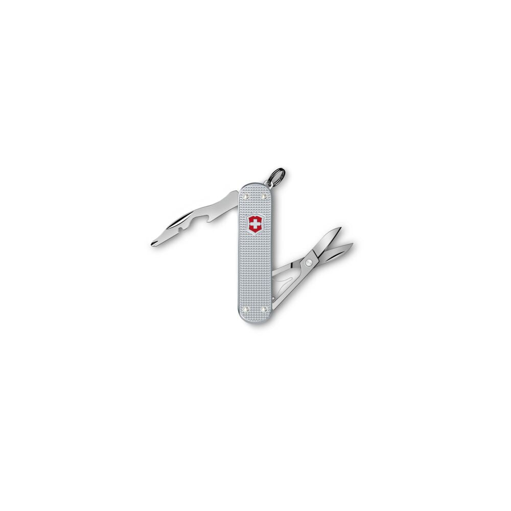 Multitool with various tools on a white background