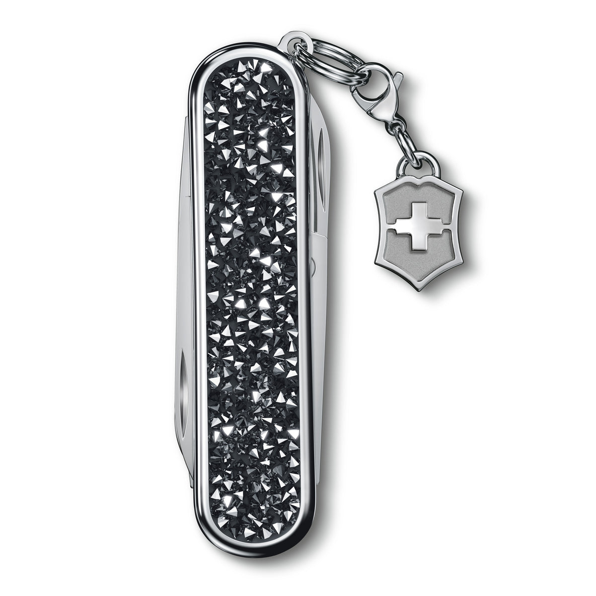 Closed keychain multi-tool with black crystal-pattern handle and shield charm