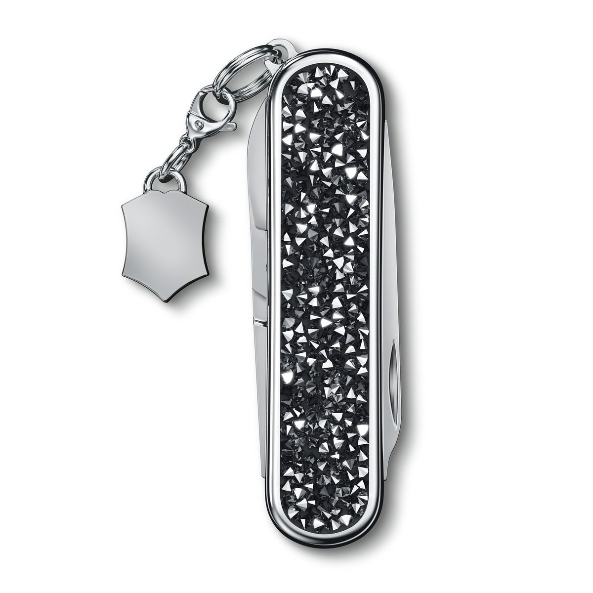 Keychain multi-tool with black crystal-pattern handle and metal shield charm