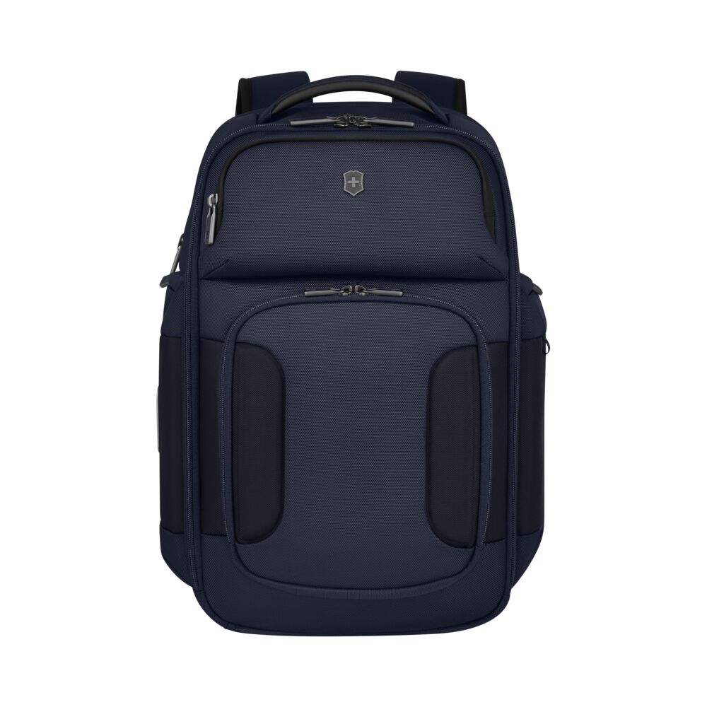 Navy blue textured backpack front view with small crest emblem and pockets