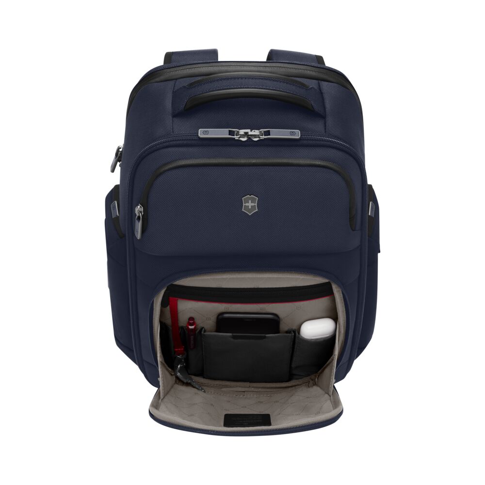 Blue backpack open showing interior organization and padded laptop sleeve compartment