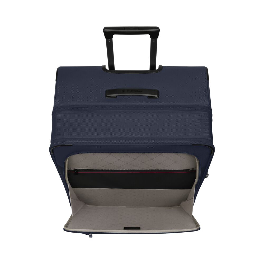 Open blue rolling hard case suitcase showing interior compartments and divider