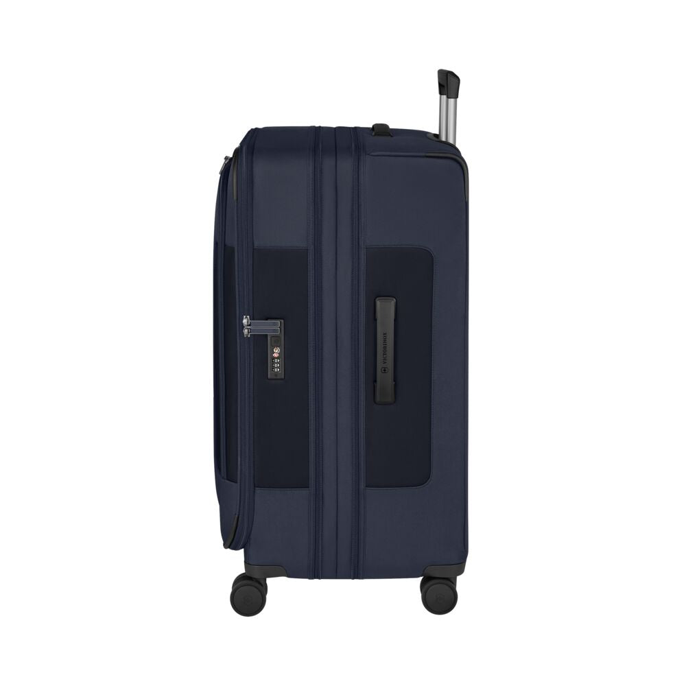 Large upright suitcase in navy blue with front zipper pocket and spinner wheels