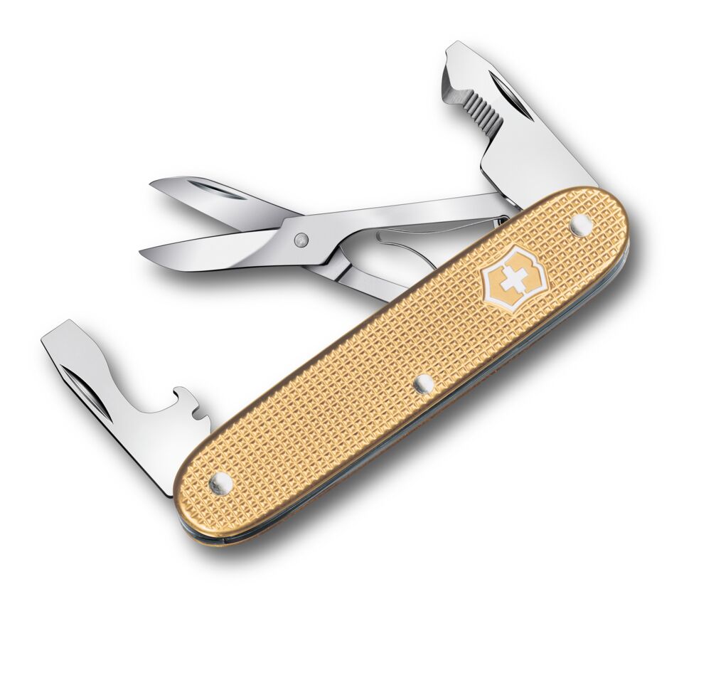 Multitool with various tools on a beige handle against a white background
